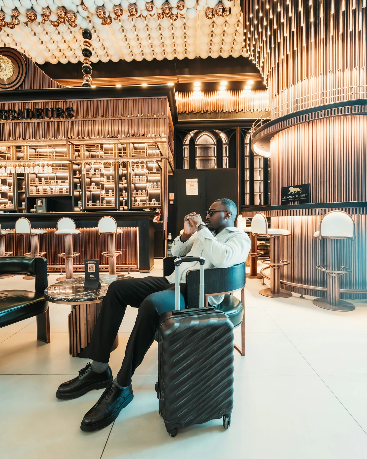 Private traveller arriving in a refined hospitality setting.